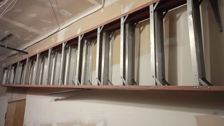 14' fiberglass and aluminum step ladder.