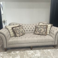 2 large tufted sofas in like new condition