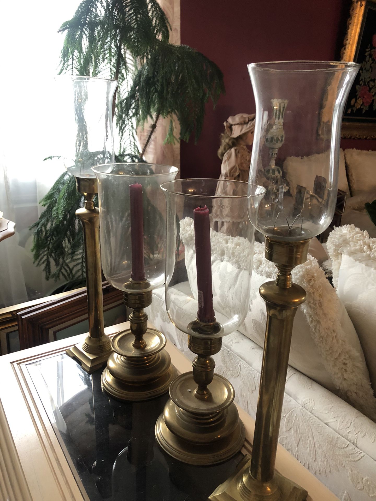 Four brass candle holders