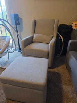 Nursery rocking/gliding chair with ottoman
