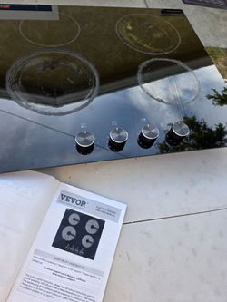 Used 4 burner electric range top.