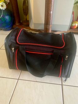 pet carrier., pet vest, folding chair