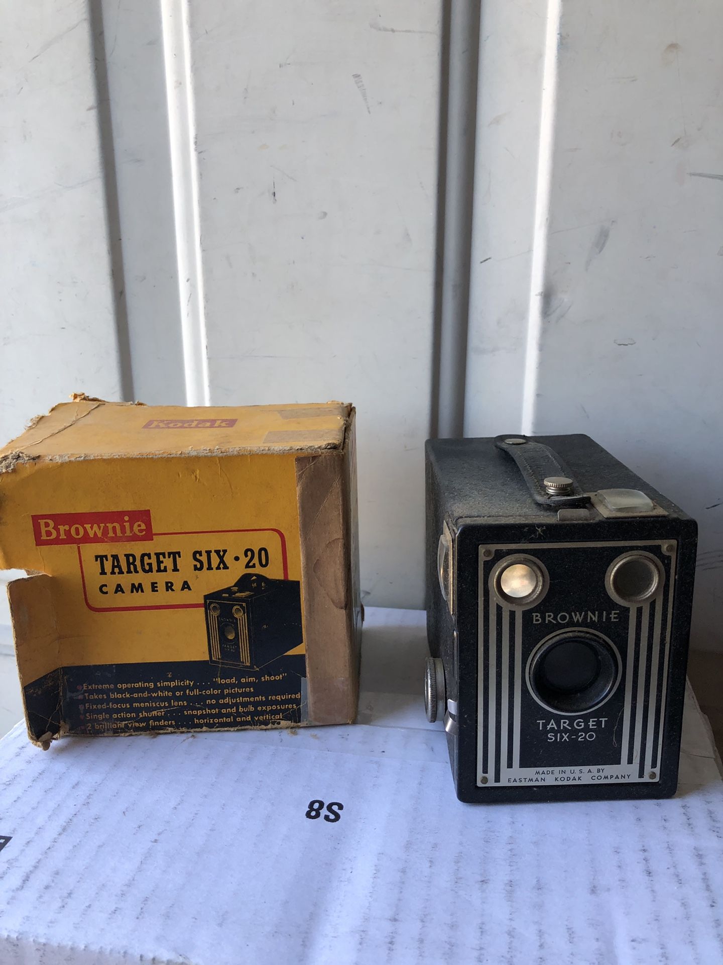 8 mm Argus Showmaster movie projector and screen.