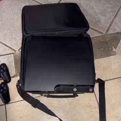 PS3 SLIM With 2 Controllers And The Case