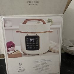 The Pioneer Woman Linen Speckle 6-Quart Pressure Cooker.