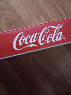 Coca-Cola vending machine paper towel holder.