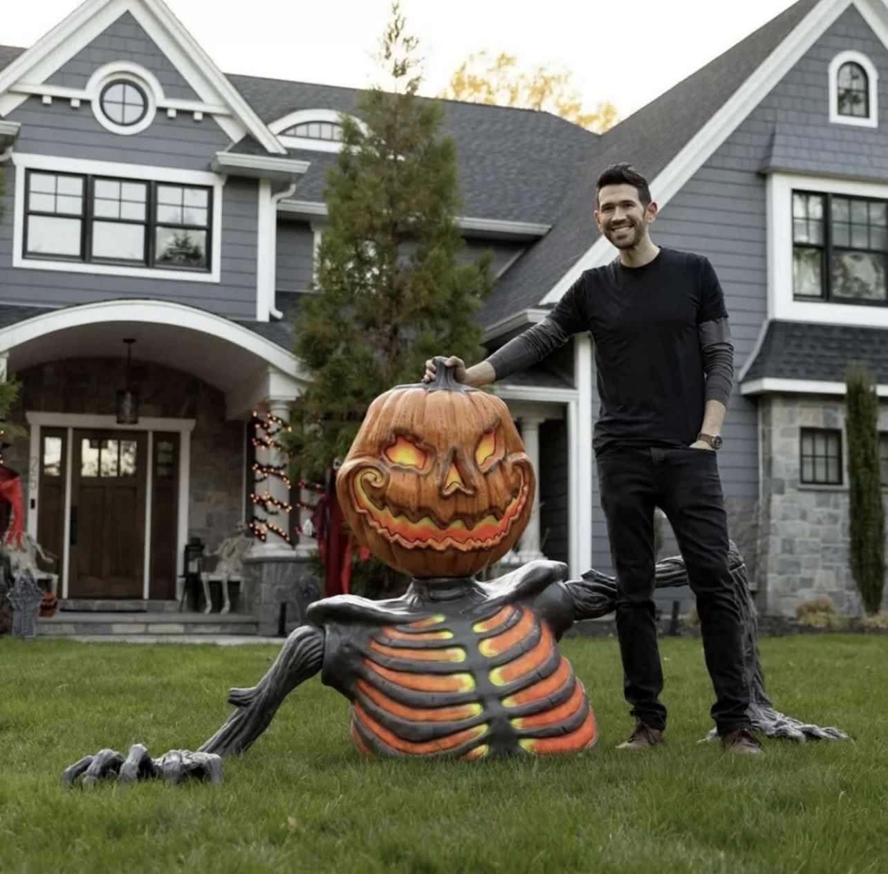 EMBERS Pumpkin Skeleton Groundbreaker 4 ft Tall Black Light Halloween Decoration
