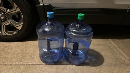 Empty 5 gallon water bottles