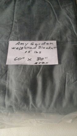 A. G. Weighted Blanket 60" X 80" 15 lbs. Grey in color