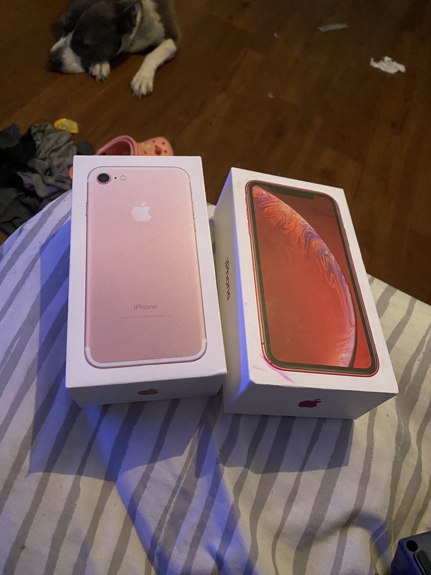 2 iPhone BOXES iPhone XR and iPhone 7 with the books