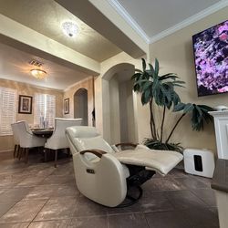 Power leather rocker swivel recliner chair in excellent condition