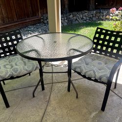 Patio table & chairs set w/ cushions
