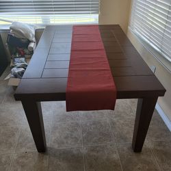 Brown table size 64 - 80" W x 40" D x 31" H