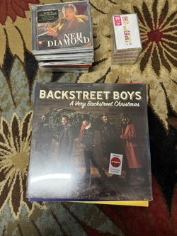 CD, Vinyl, And cassette tape music 