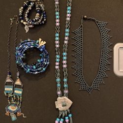 3 Necklaces And A Set Of Bracelets 