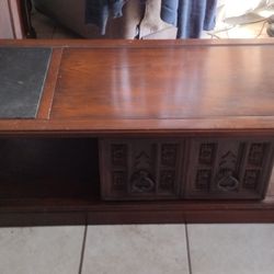 Great Condition Coffee Table With Sliding Door