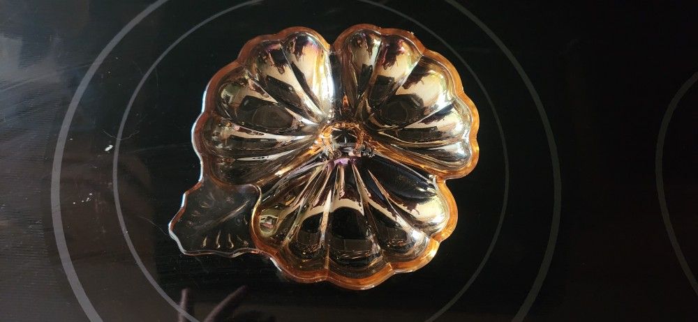 Vintage Marigold Jeanette carnival glass clover shaped candy dish.