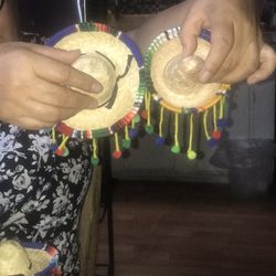 mini hat for chihuahua dog. or to hang. anywhere. asking 10. dollars. the small size. and 12 dollars the biger size.. 