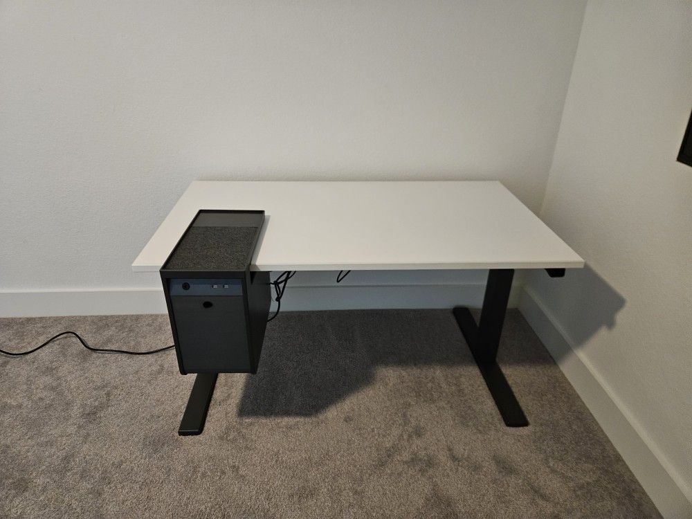 Height-adjustable standing desk, sit-stand desk, or stand-up desk
