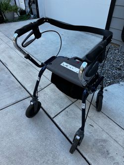 Dolomite 4-Wheel Rollator Walker with Seat and Storage Bag