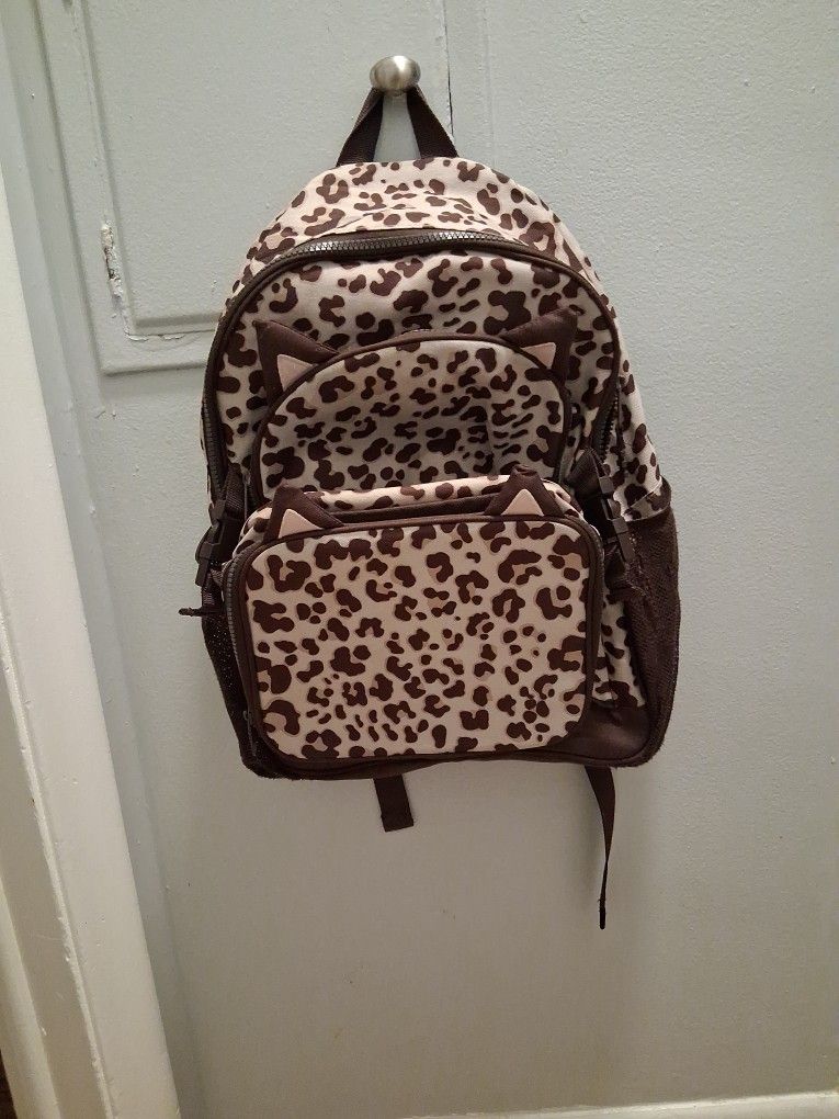 π Print Back -Pack With Removeable Lunch -Bag On Front Of It