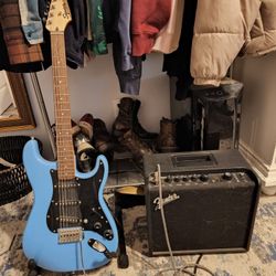 Squire Stratocaster Electric Guitar and Fender Mustang LT25 Amp