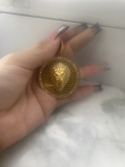 Lion gold coin pendant
