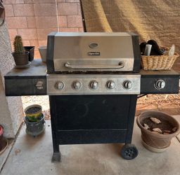 Grill with a propane tank