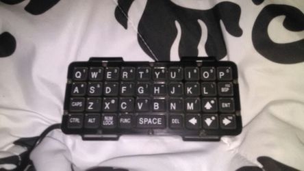 Mini keyboard (straps on arm)