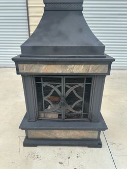 Beautiful metal Outdoor Wood burning Fire place