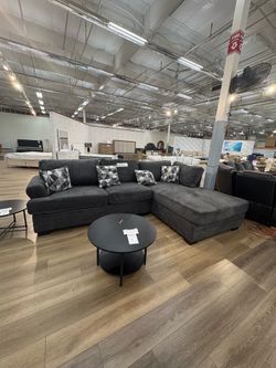New dark gray sofa with reversible chaise + accent pillows