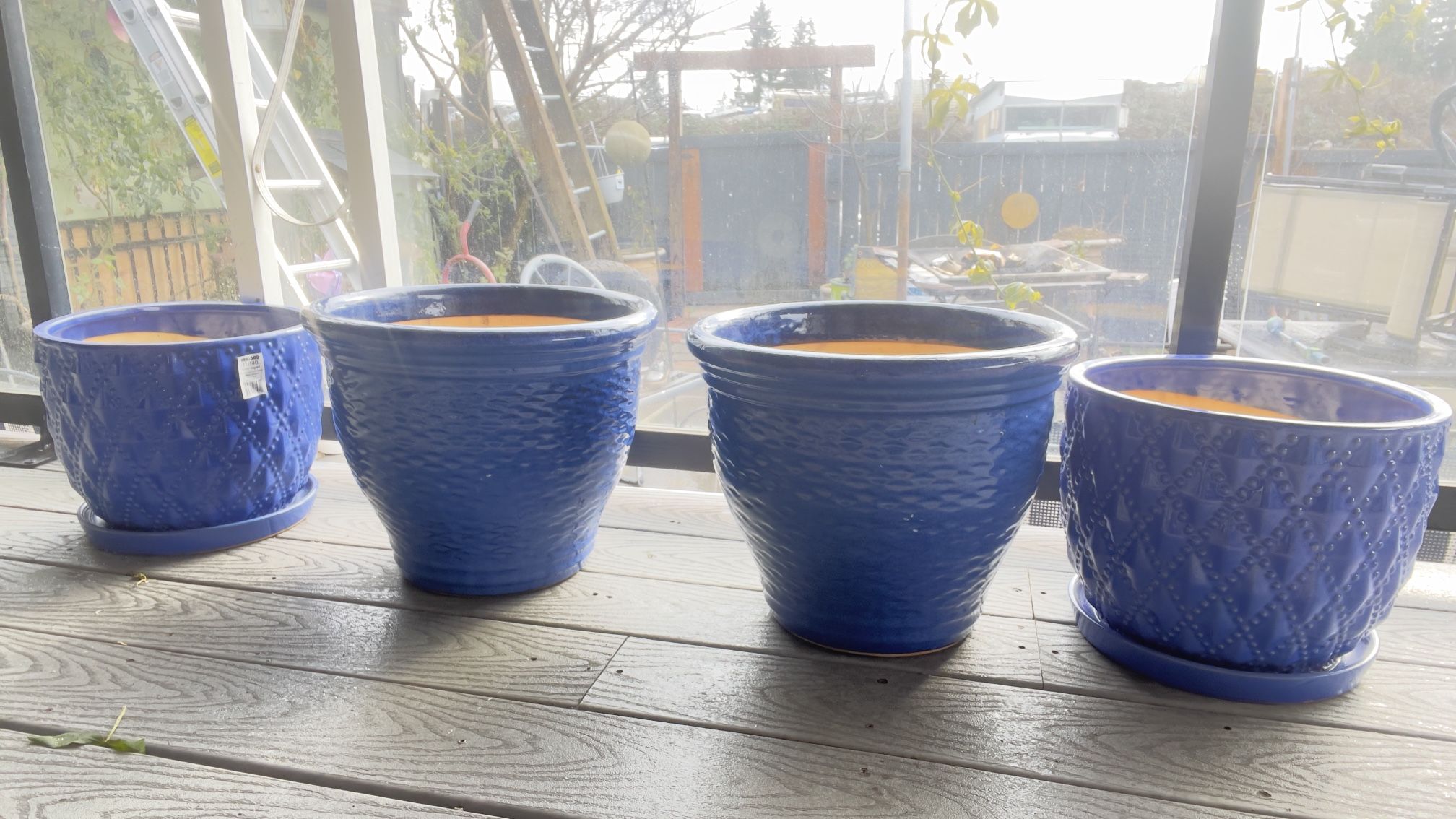 Four Brand New Flower Pots $100
