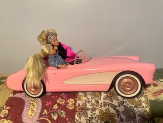 Barbie car with dolls