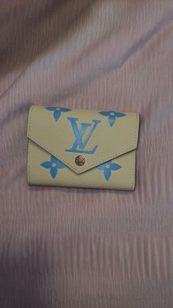 Cream and powder blue wallet