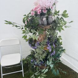 Two beautiful tall floral stands