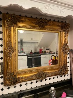 Beautiful gold wood beveled mirror