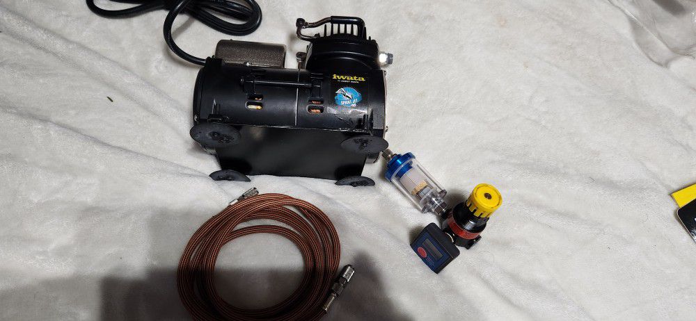 Iwata airbrush compressor and airbrush guns and many Accessories