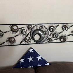 Metal wall hanging from Hobby Lobby  Measures: 4’Lx1’H Smoke and pet free home  PU near the Kennewick Walmart 