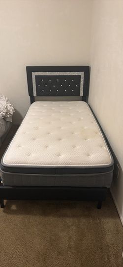Full mattress and full bed frame