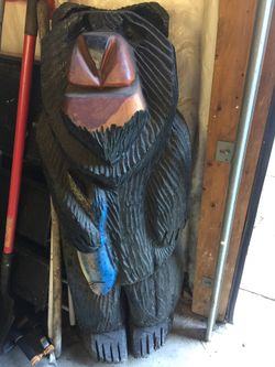 Carved wooden bear statue