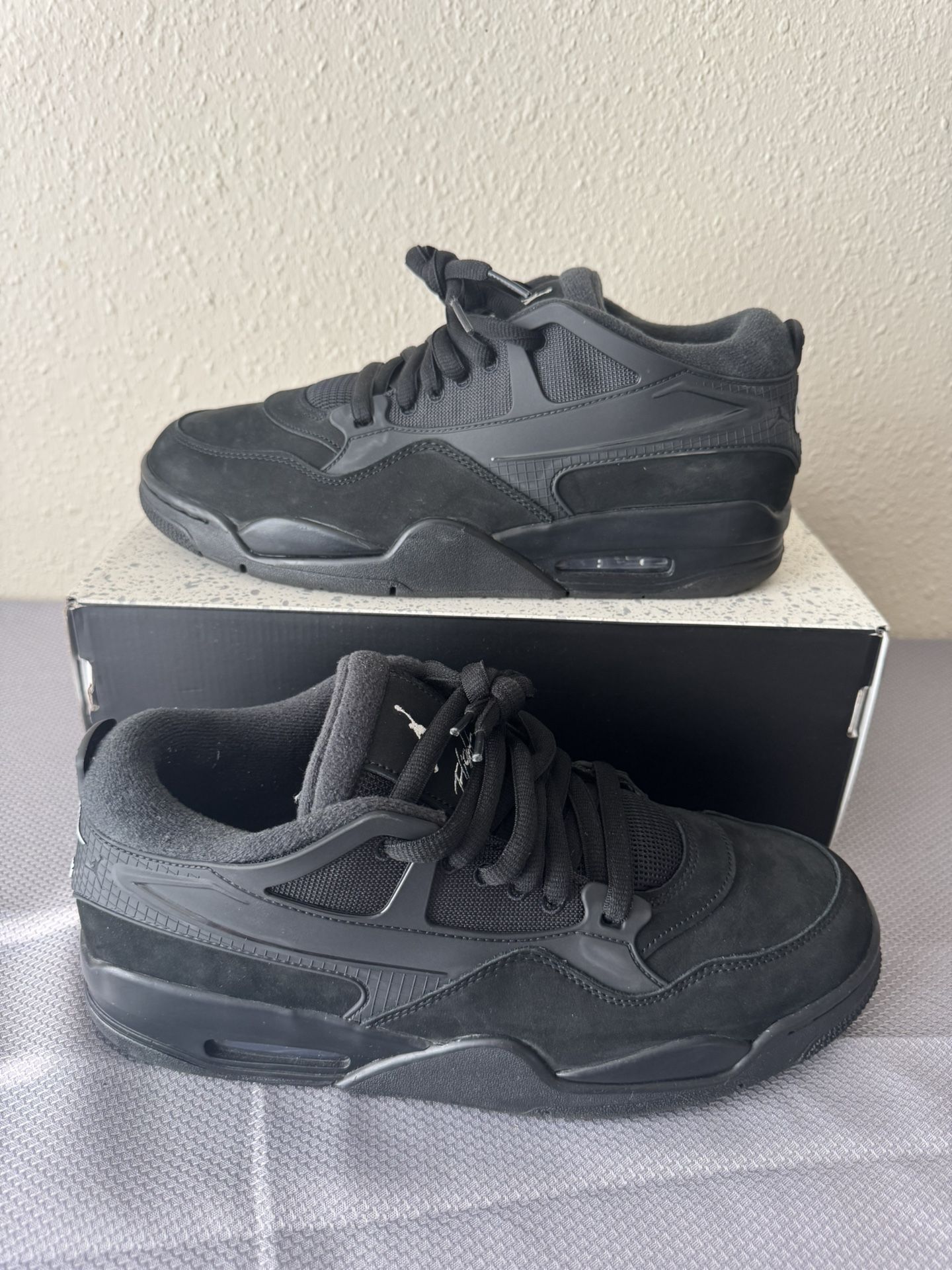 Jordan 4 RM Black Cat