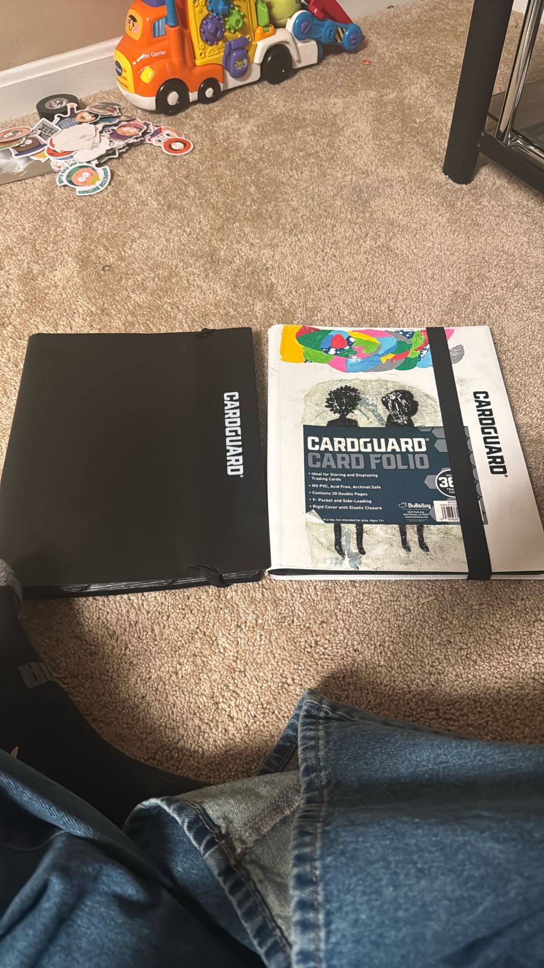 two binders of really good pokemon cards