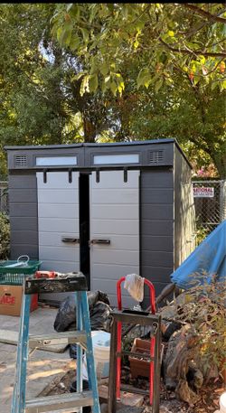 Storage Shed with Floor Kit With free delivery  if you want it to be assembled it's $100 extra