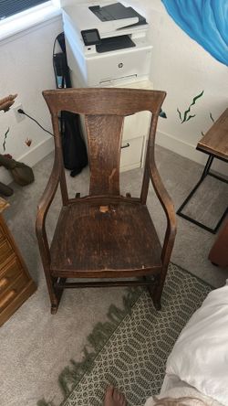 Vintage solid oak rocking chair