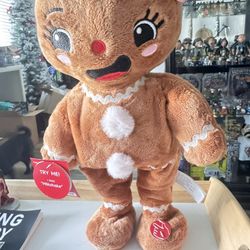 This is an Animated Musical Gingerbread Girl Christmas Plush by Holiday Time.  