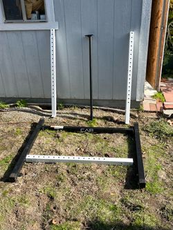 CAP OLYMPIC BARBELL, power rack and two 10 lbs plates