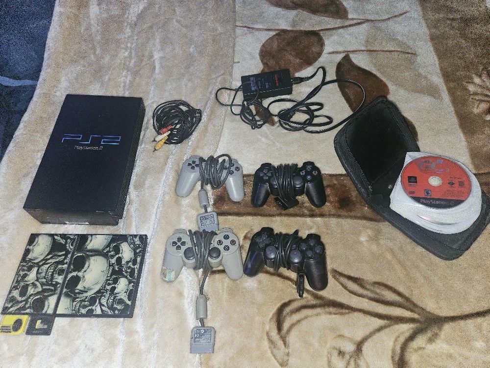 Ps2 And Ps2 slim 20 Games And 1 Modded Diks With 100 Plus Games