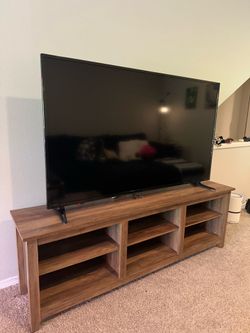 Insignia 65 inch TV w/ TV stand