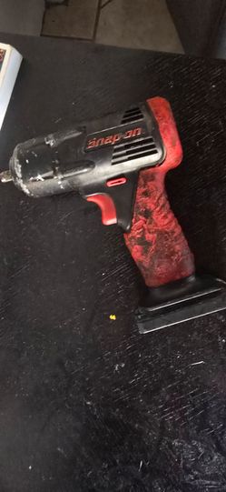 Well used Snapon impact. 3/8 No battery.