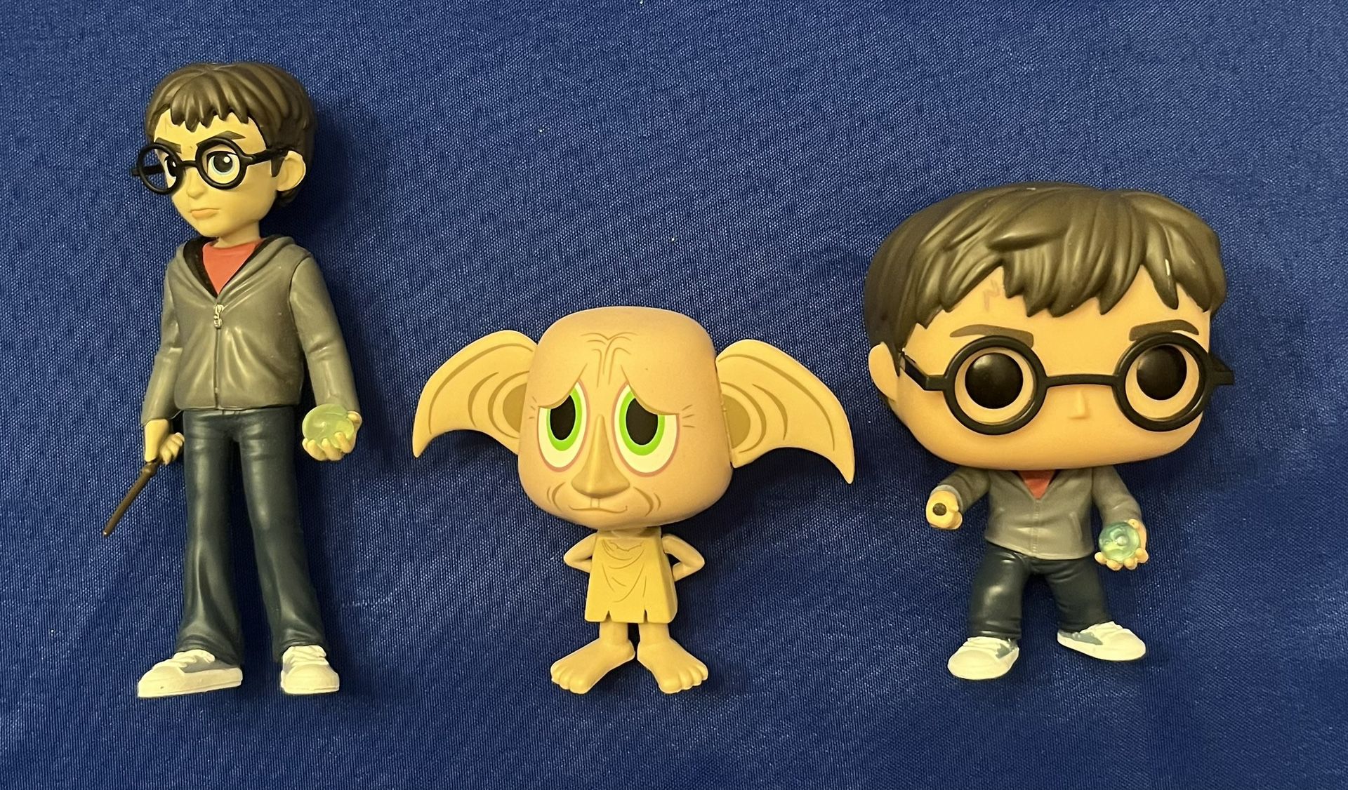 2 Funko Dolls: Harry Potter And Dobby And 1 Other Harry Potter Figurine